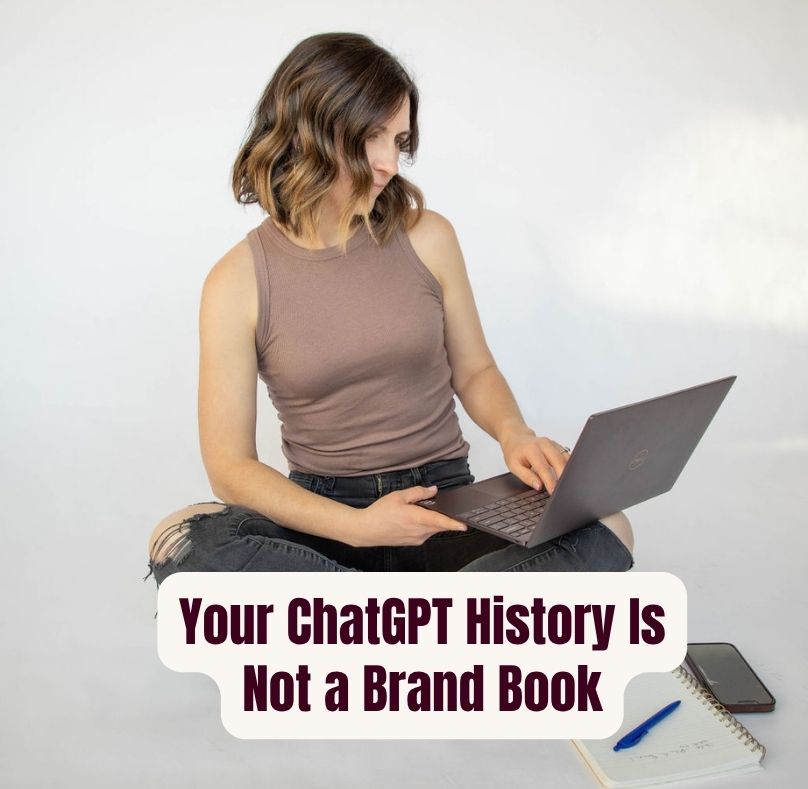 Woman sitting cross-legged on the floor typing on a laptop, with text overlay reading "Your ChatGPT History Is Not a Brand Book"